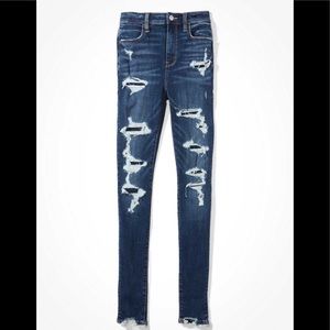 Patched dark washed skinny jeans